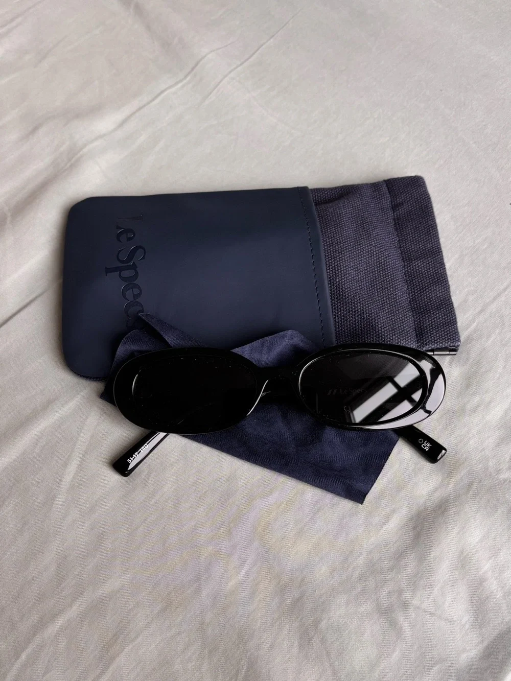 Le Specs Outta Love Black Oval Sunglasses
